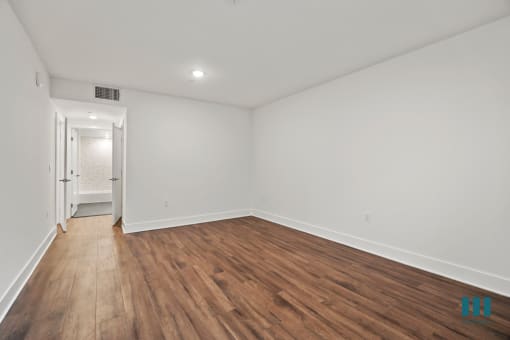 Bedroom with Recessed Lighting, Vinyl Flooring, and Bathroom