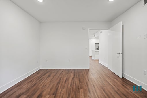 Bedroom with Vinyl Flooring and Recessed Lighting