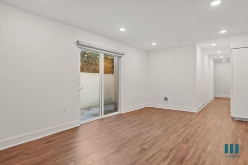 Living Room Space with Patio and Vinyl Flooring