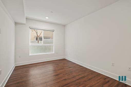 Bedroom with Large-Size Windows, Vinyl Flooring, and Recessed Lighting