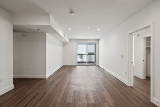 Living Room with Recessed Lighting, Vinyl Flooring, and Patio