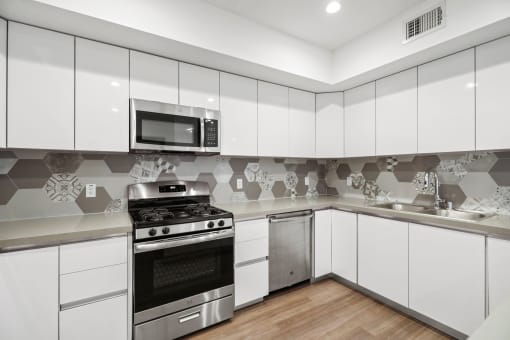 Kitchen with Energy-Efficient Stove and Microwave Oven