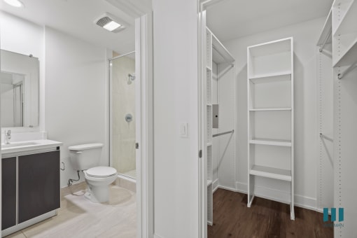Bedroom with Bathroom and Walk-In Closet with Shelving