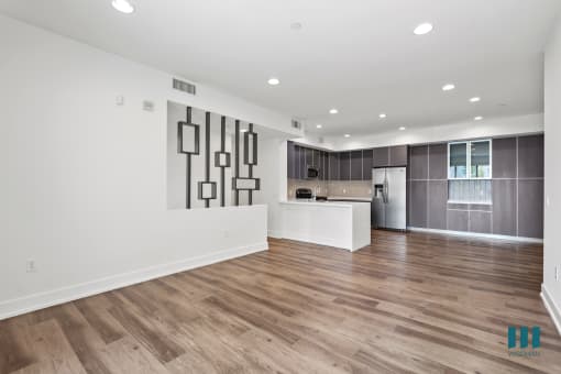 Living Room with Recessed Lighting, Vinyl Flooring, and Patio