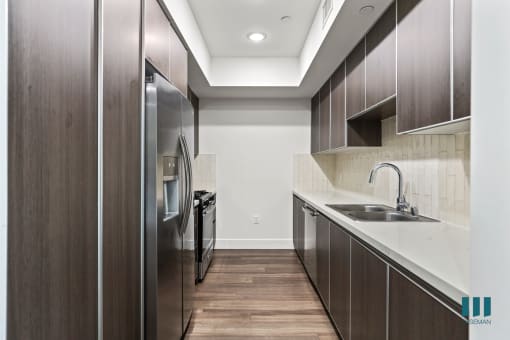 Kitchen with Stainless Steel Appliances and Ample Cabinet Storage