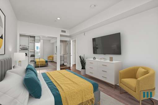 Bedroom with Mirrored Closet with Shelving, Bathroom, and Vinyl Flooring
