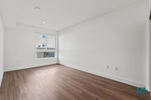 Bedroom with Vinyl Flooring, Recessed Lighting, and Windows