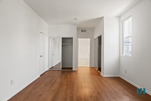 Bedroom with  Bathroom and Double Closets