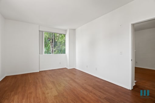 Bedroom with Windows and Vinyl Flooring