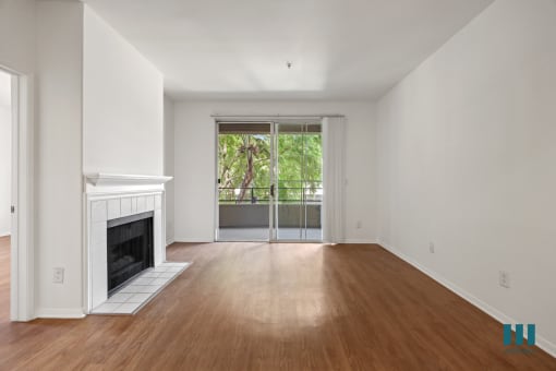 Living Room with Electric Fireplace, Vinyl Flooring, and Patio