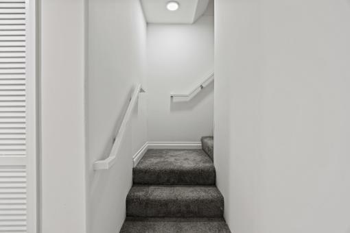 Staircase to Upper Level of Apartment Home