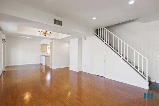 Open-Concept Kitchen, Dining, and Living Room Townhome Style