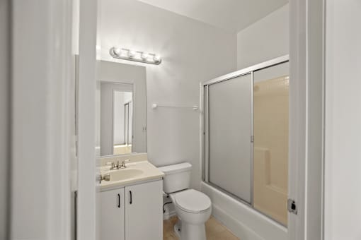 Bathroom with Bathtub with Glass Doors