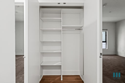 Hall Closet with Built-In Shelving