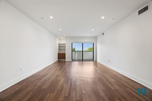 Open-Concept Dining and Living Room with Patio