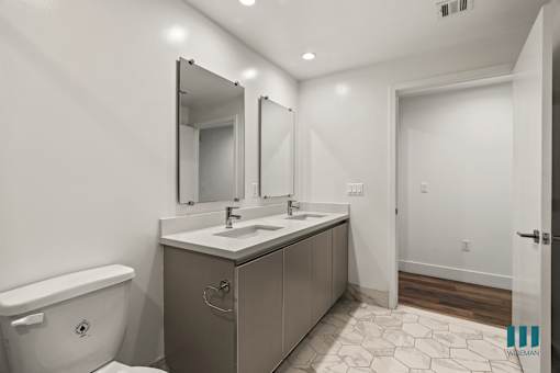 Bathroom with Double-Sink and Vanity Cabinet Storage
