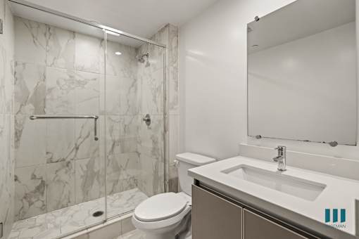 Bathroom with Walk-In Shower and Vanity Cabinet Storage