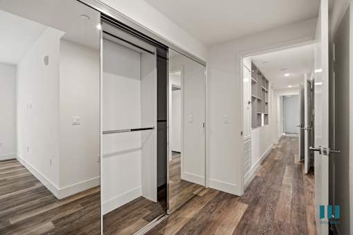 Bedroom with Large Mirrored Closets