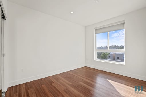 Bedroom with Large-Size Windows and Lots of Natural Light