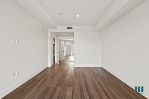 Bedroom with Vinyl Flooring and Recessed Lighting