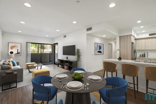 Open-Concept Kitchen, Living, and Dining Room with Patio