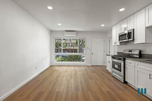 Open-Concept Kitchen, Dining, and Living Room Areas