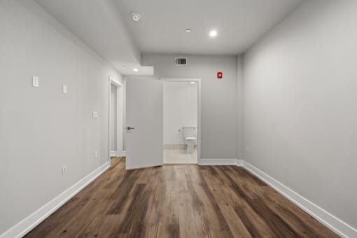 Bedroom with Vinyl Flooring and Bathroom