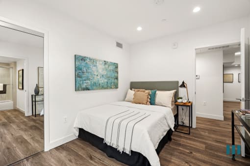 Bedroom with Mirrored Closet, Vinyl Flooring, and Recessed Lighting
