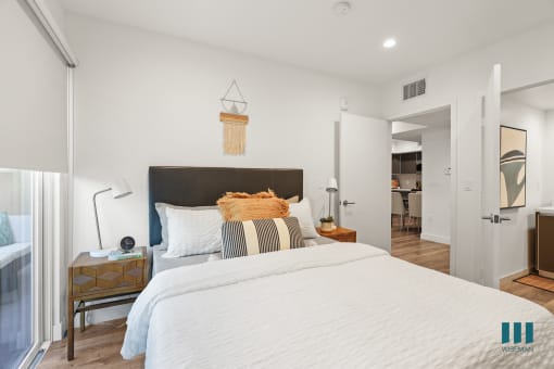 Bedroom with Private Entrance, Bathroom, and Mirrored Closet