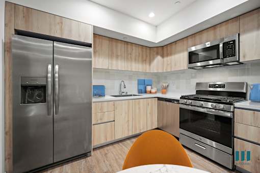 Kitchen with Energy-Efficient Appliances and Ample Cabinet Storage