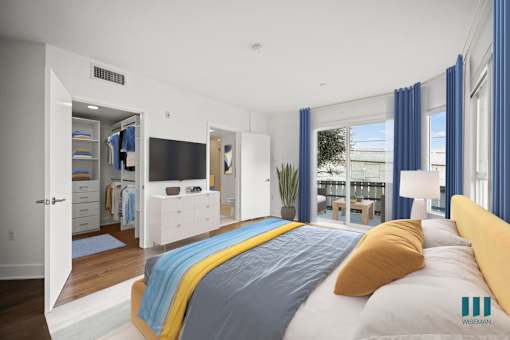 Spacious Primary Bedroom with Walk-In Closet, Bathroom, and Patio