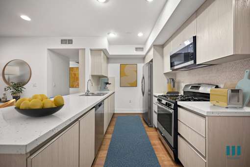 Kitchen with Energy-Efficient Appliances and Ample Cabinet Storage