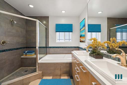 Large-Size Bathroom with Walk-In Shower, Bathtub, and Double-Sink Vanity