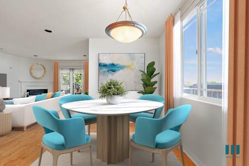 Open-Concept Dinign and Living Room Space with Vinyl Flooring and Natural Lighting