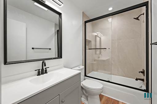 Bathroom with Shower Bath and Vanity Cabinet Storage