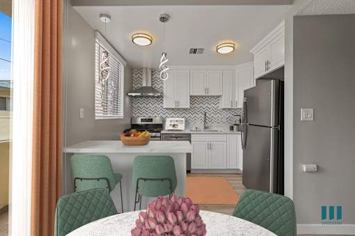 Open-Concept Kitchen with Countertop Bar and Dining Area