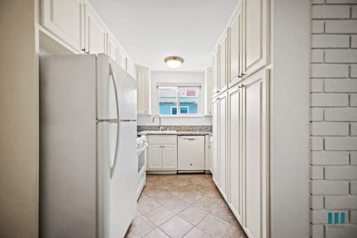 Kitchen with Refrigerator, Stove, Dishwasher, and Ample Cabinet Storage