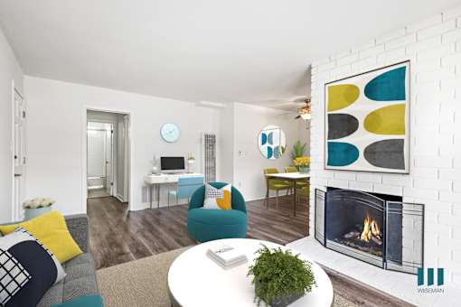 A living room with a fireplace and a couch.