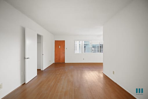 Entryway, Living, and Dining Room with Windows