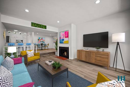 A modern living room with a fireplace and a television.