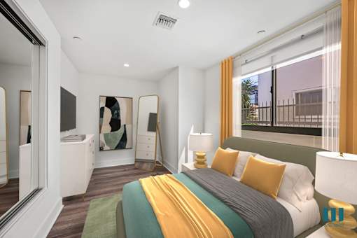 Bedroom with Large-Sized Windows and Mirrored Closet - Two-Bedroom Two-Bathroom - Unit 108