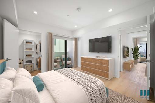 A modern bedroom with a large bed and a flat screen TV mounted on the wall.