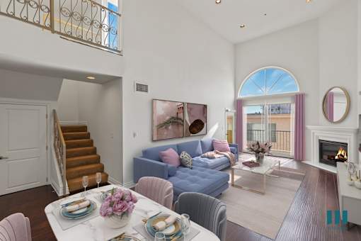 Spacious Living Room with Large-Size Windows, Balcony, Fireplace, and Vinyl Flooring