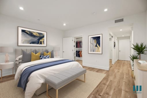 Spacious Bedroom with Walk-In Closet, Vinyl Flooring, and Recessed Lighting