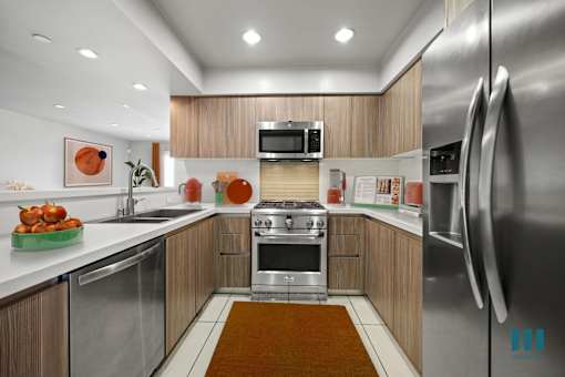 Large-Size Kitchen with Stainless-Steel Appliances and Ample Cabinet Storage