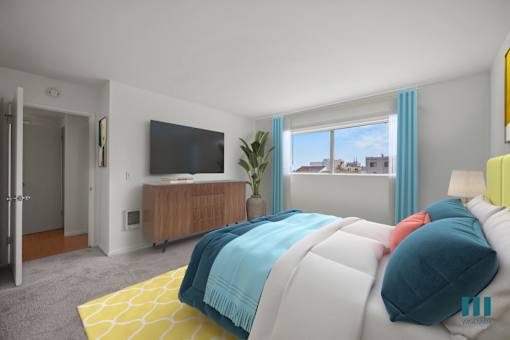 Spacious Bedroom with Windows and Carpet