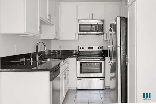 Kitchen with Stainless-Steel Appliances and Ample Cabinet Storage