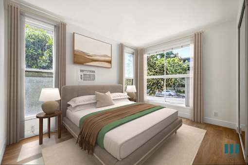 Bedroom with Multiple Windows, Vinyl Flooring, and a Mirrored Closet