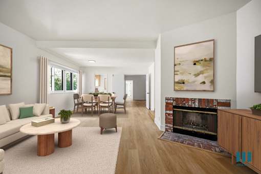 Large-Size Living Room with a Fireplace, Multiple Windows, and Vinyl Flooring