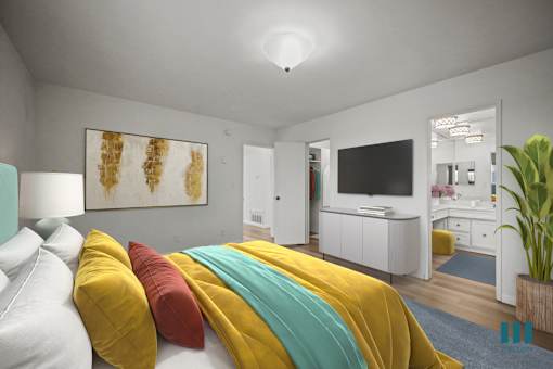 A bedroom with a bed covered in yellow and red pillows.